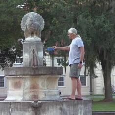 Chuck Hopkinson sprinkling some of Barry at the Turkey Fountain on Sapelo Island