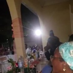 23/11/2019 - Ni George,proud son his Mum as Mami Cecilia Gang delivers her speech at her welcome party in Maroua.