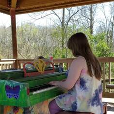 Kayley playing the piano at East Cobb Park. March 23, 2019